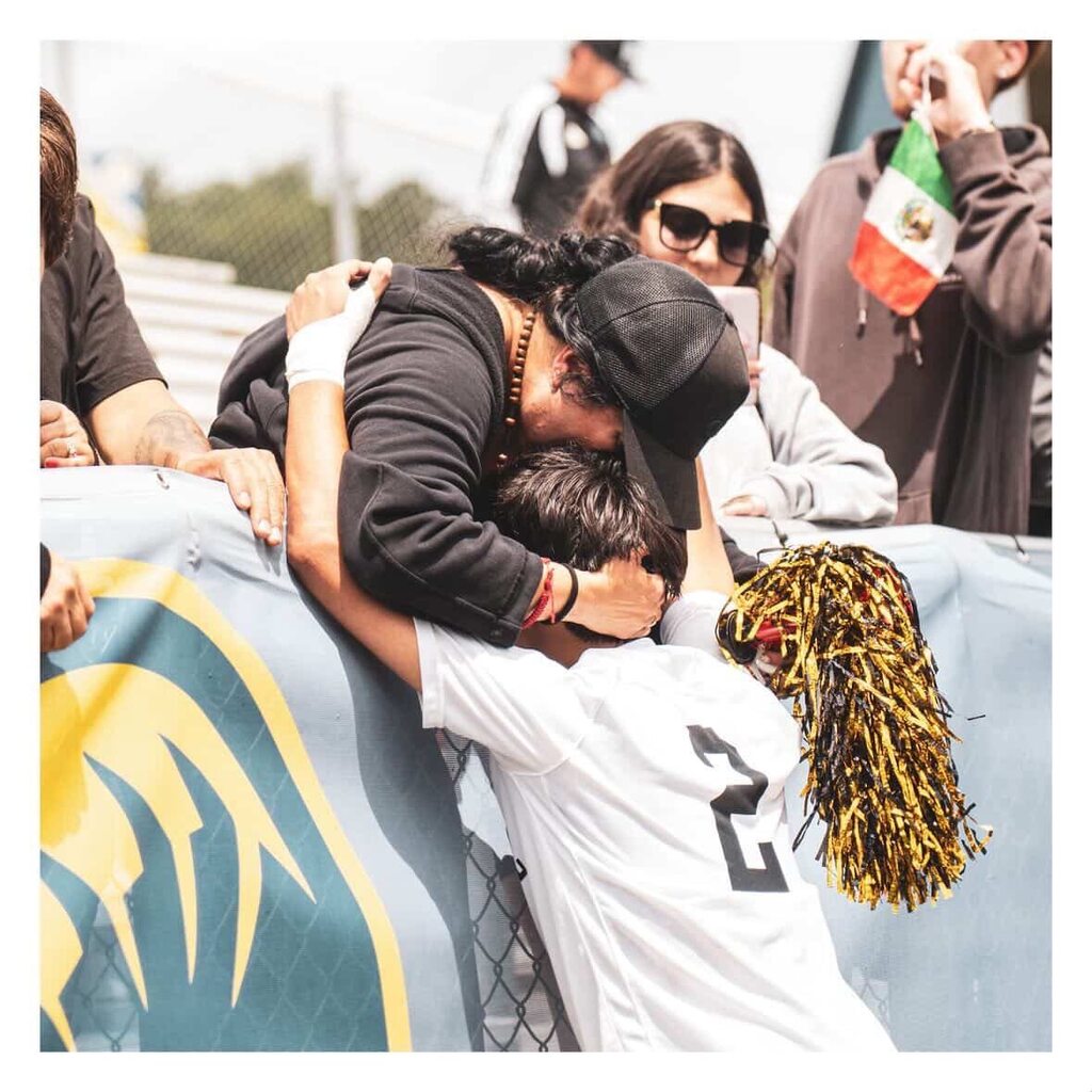 Bentonville High Soccer Player Hugging His Mom After Championship Win
