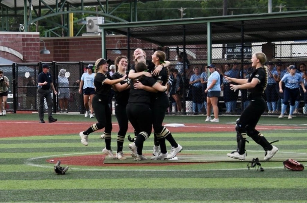 Bentonville High Softball Team Hugging After Winning State