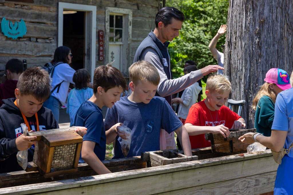 Students panning for treasures