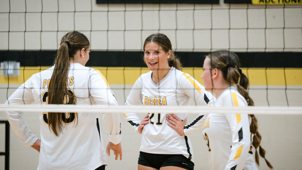 Photos of volleyball game.