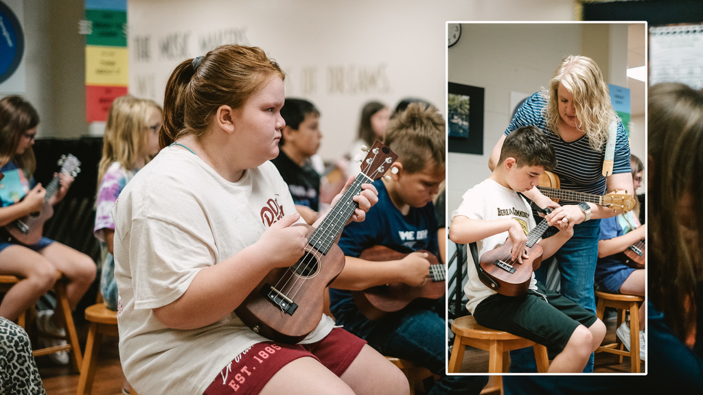 Students play ukulele in music class