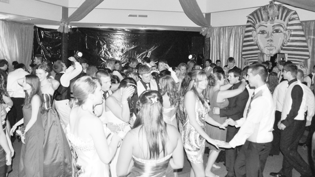 Old photo of students dancing in school atrium