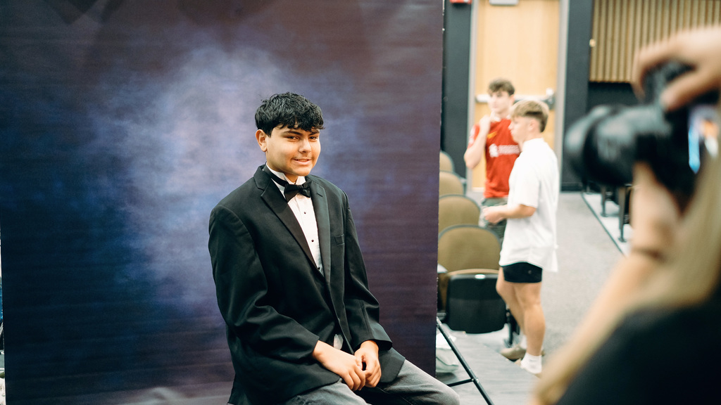Senior getting his picture taken