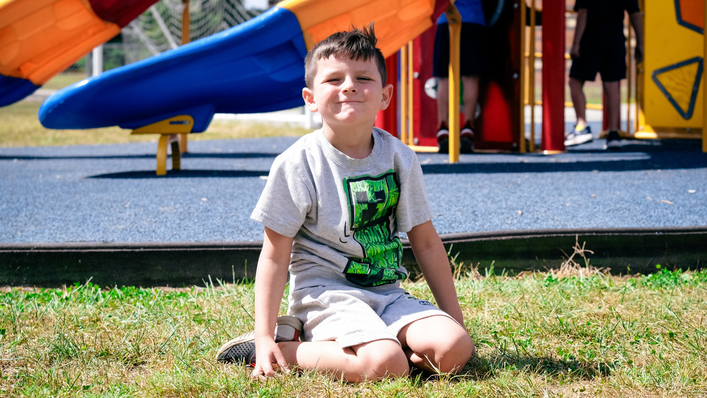 Elementary student playing on playground