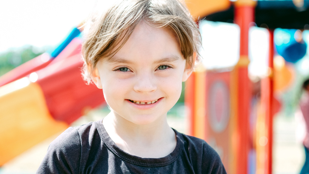 Elementary student poses for a photo