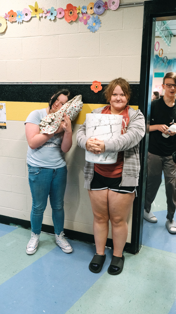 Students with various creative carrying devices