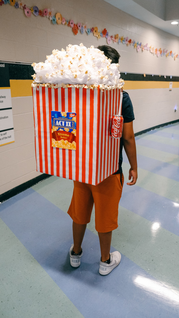 Student with Popcorn Backpack