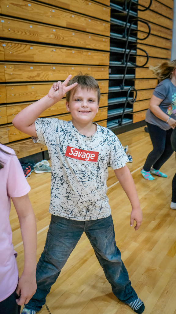 elementary student poses for a photo