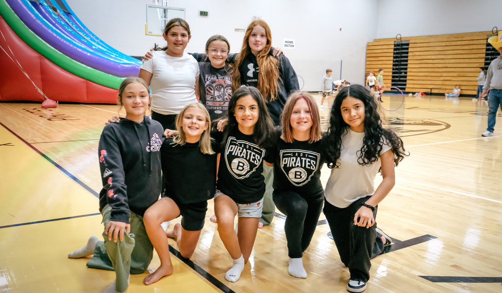 elementary students pose for a photo