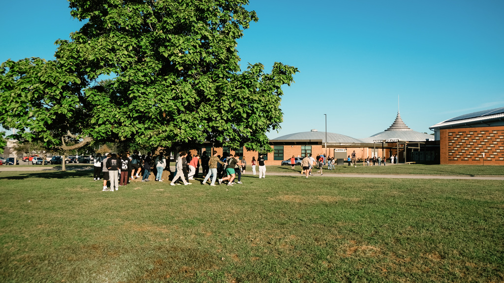 High school students outside their school