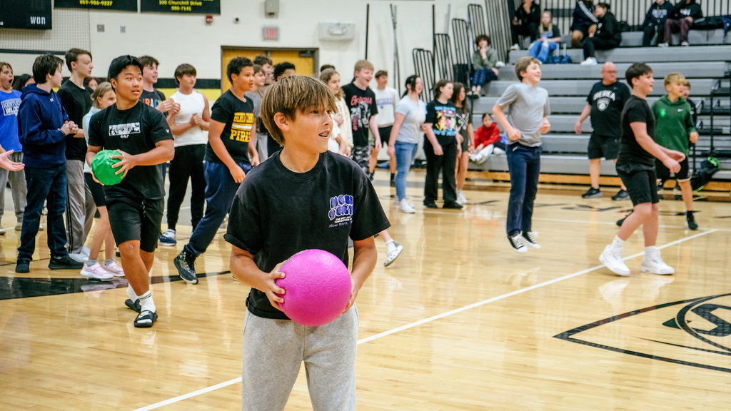 Student preparing to throw dodgeball