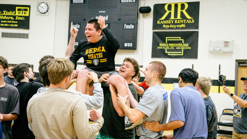 Students celebrating dodgeball win