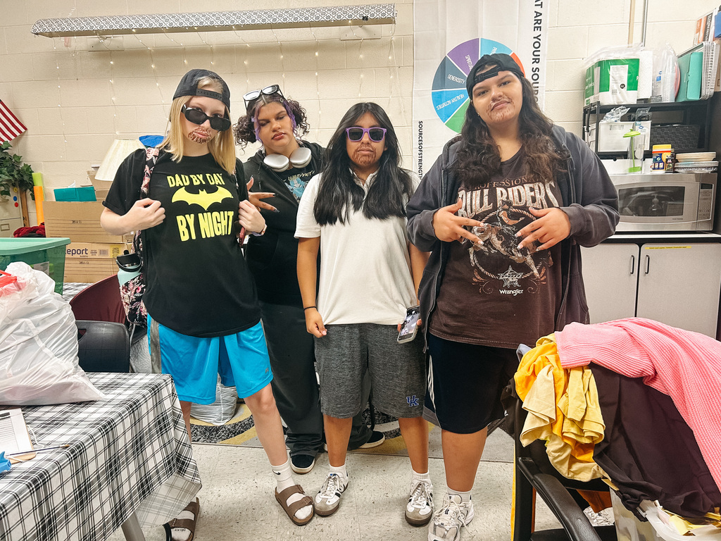 Students pose for photo dressed as Adam Sandler 