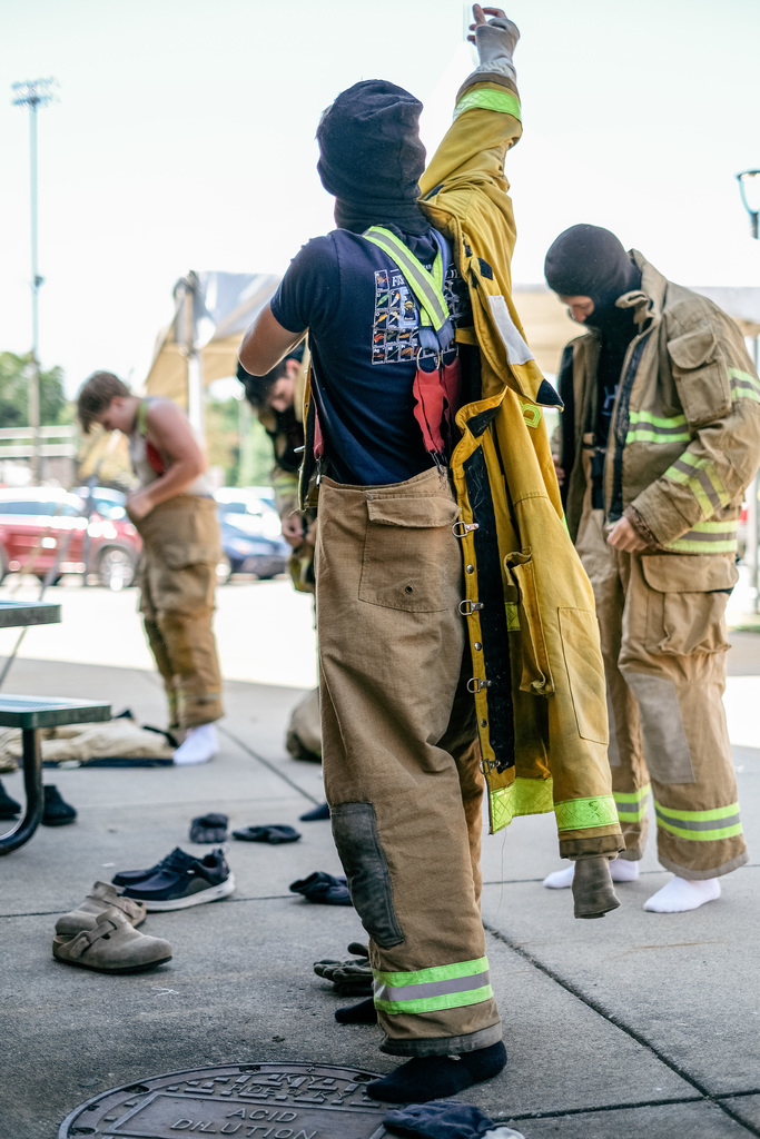 Student suits up in firefighter gear