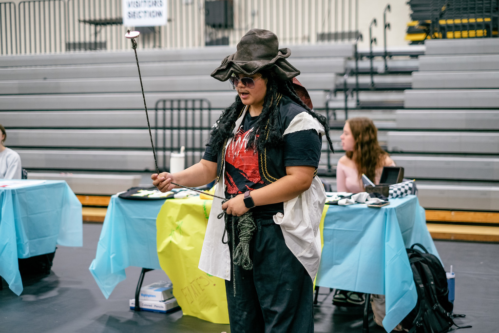 Students sign up for clubs at information booths