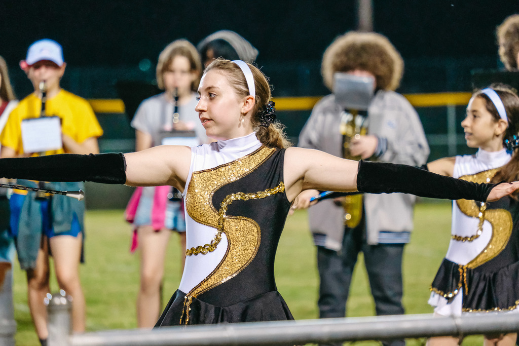 Majorettes and band performing during half time