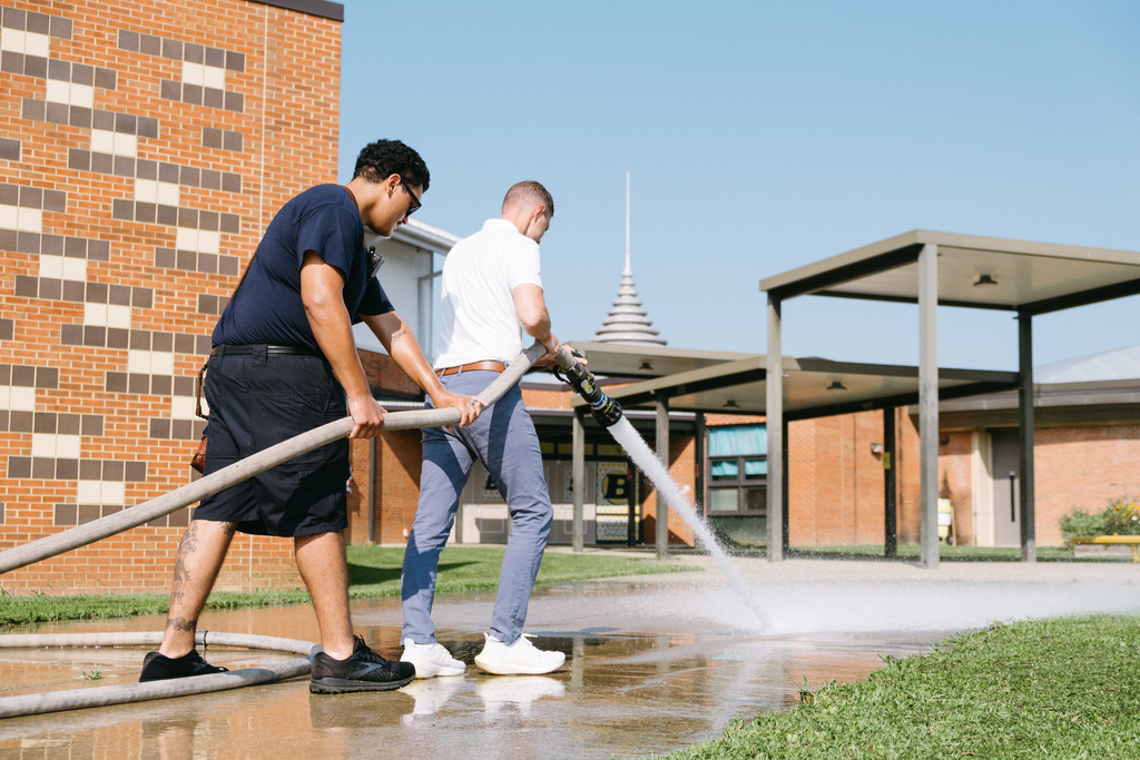 Fire Hose Cleaning School Sidewalks