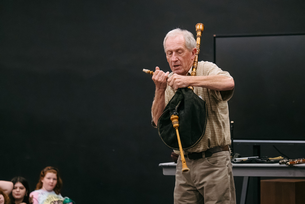 Irish Flute player John Skeleton gives presentation for students