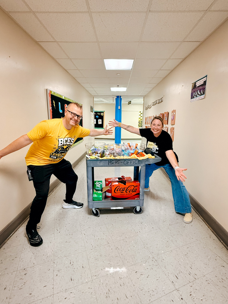 Mrs. Reynolds and Mr. Dollins Deliver Snack Cart for Elementary Teachers Today