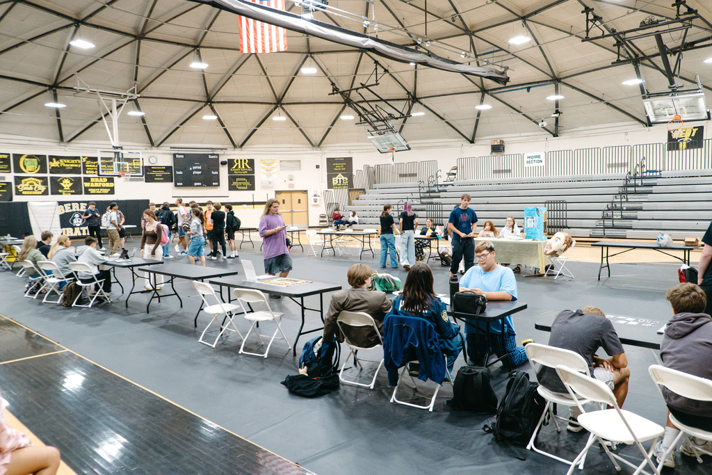 Students set up at booths for this year's club rush