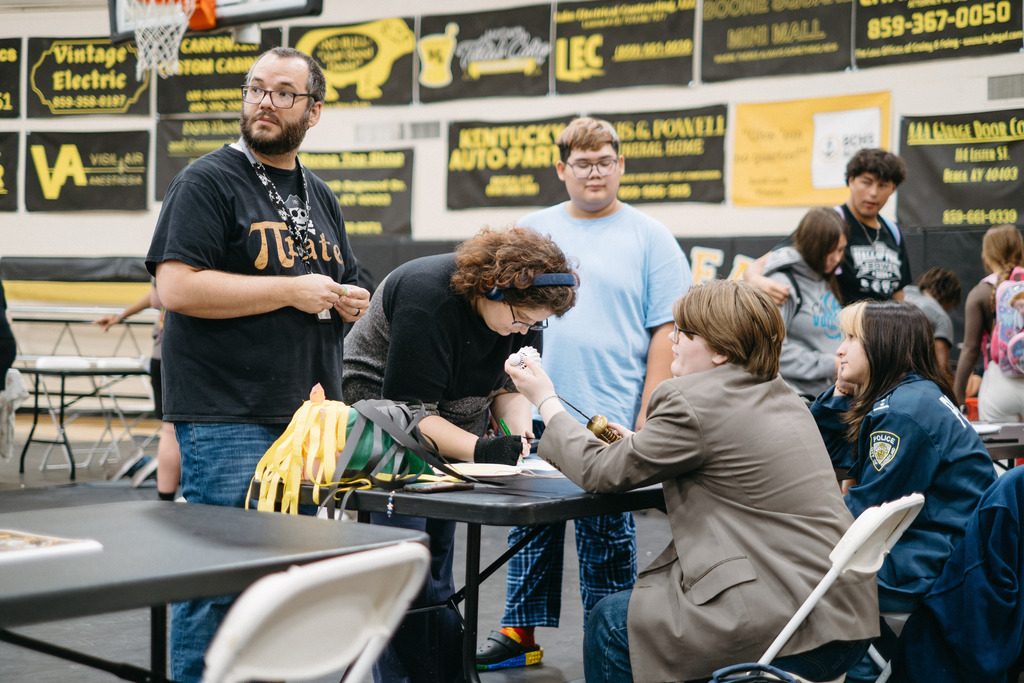 Students set up at booths for this year's club rush