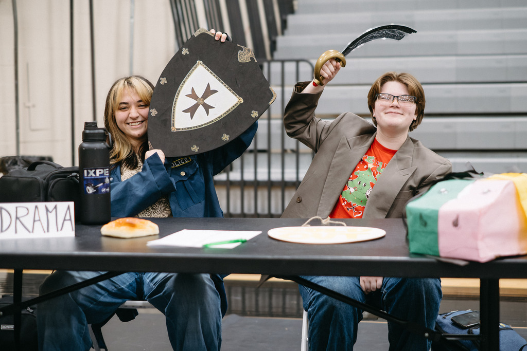 Students set up at booths for this year's club rush