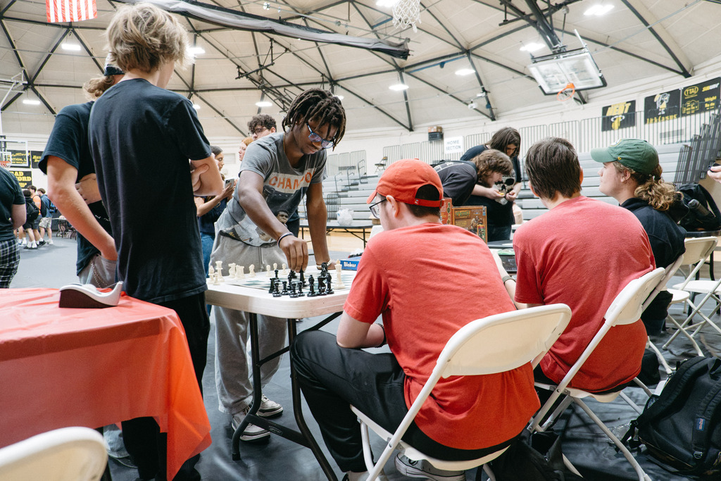 Students set up at booths for this year's club rush