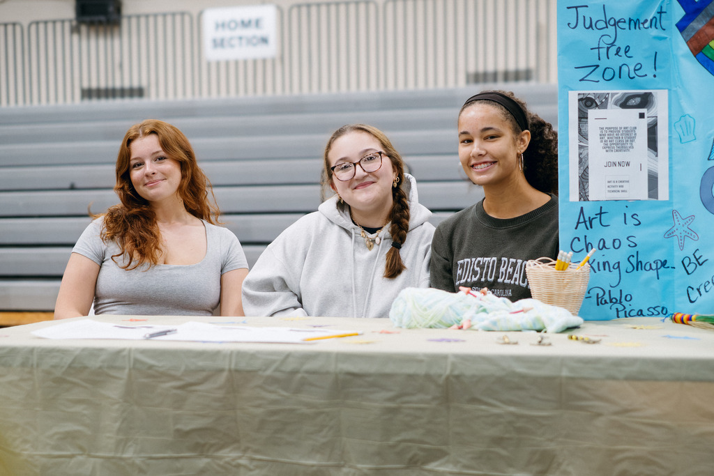 Students set up at booths for this year's club rush