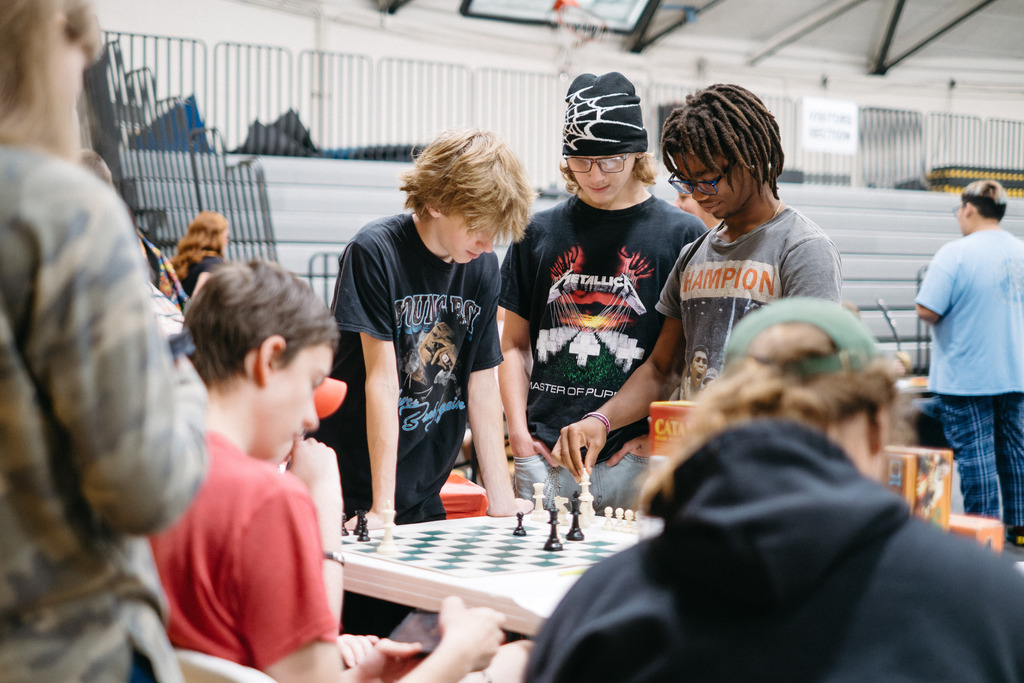 Students set up at booths for this year's club rush