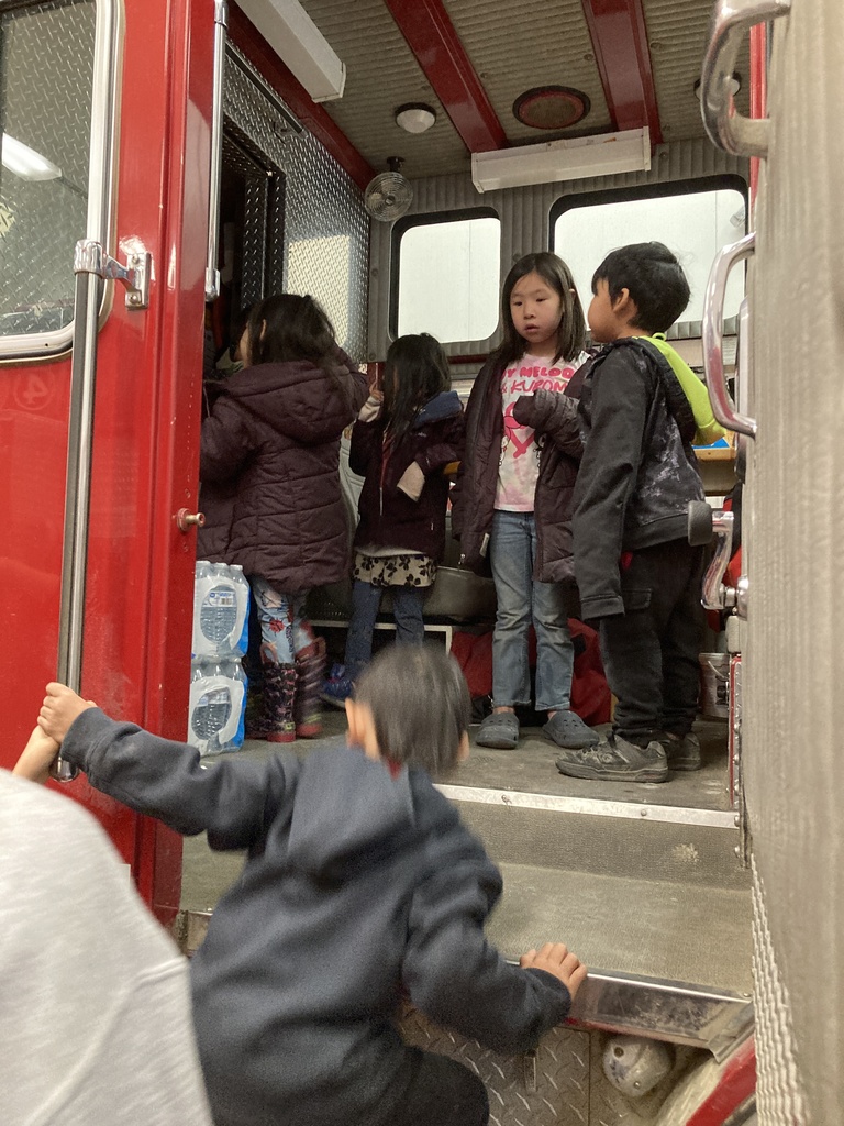 Exploring the fire truck at Nome fire station go Teller!