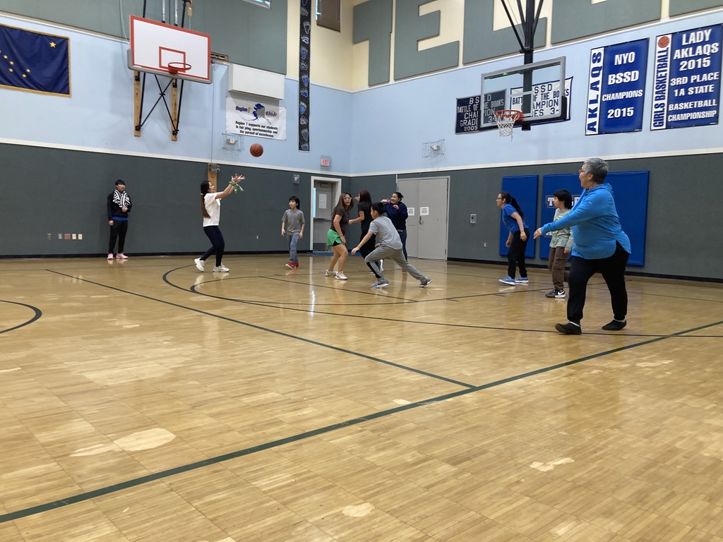 having fun playing student vs staff basketball game lucy playing