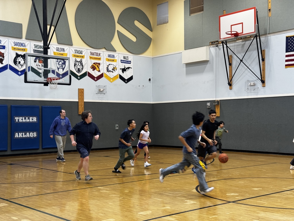 Here comes the staff Fred Weyanna Eric Boring reid Jackowick and Jasmine Teller Alaska 2025 staff vs student basketball game