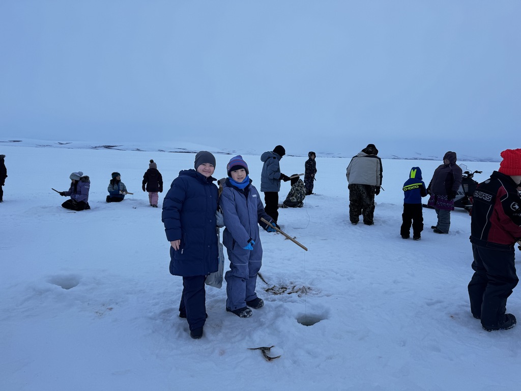 Coleen ice fishing with Jeremiah