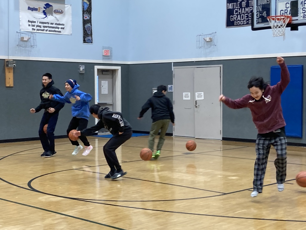 Basketball racing, with the basketball between the legs.