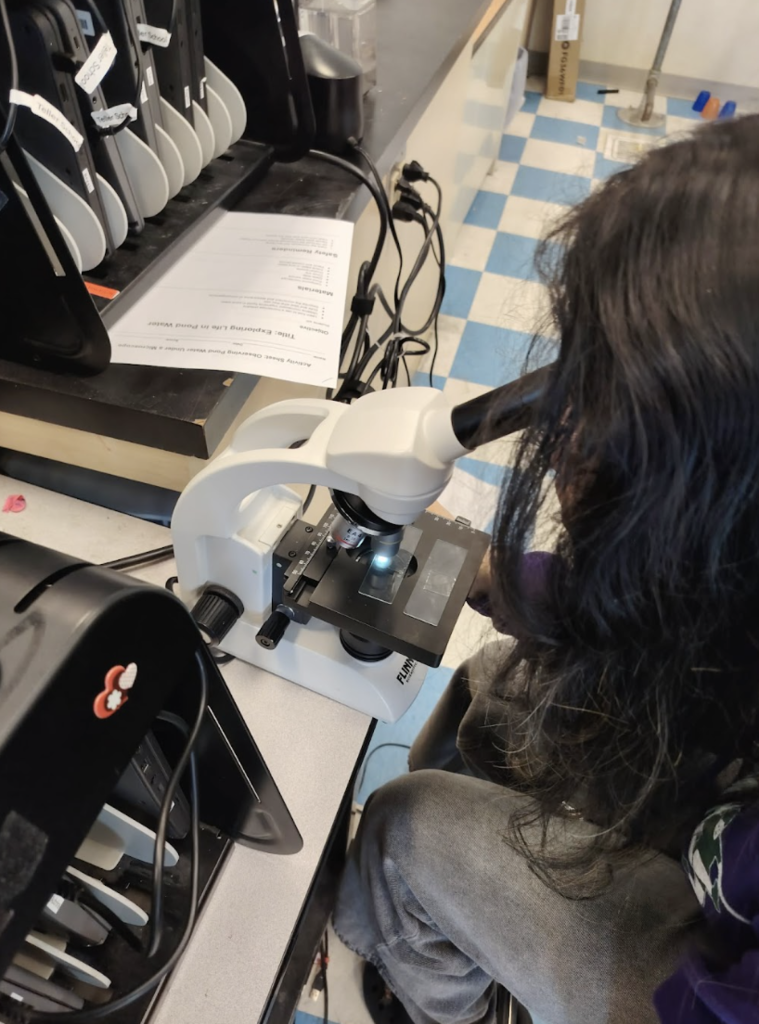 Aubrina Garnie and Microscope Teller Alaska