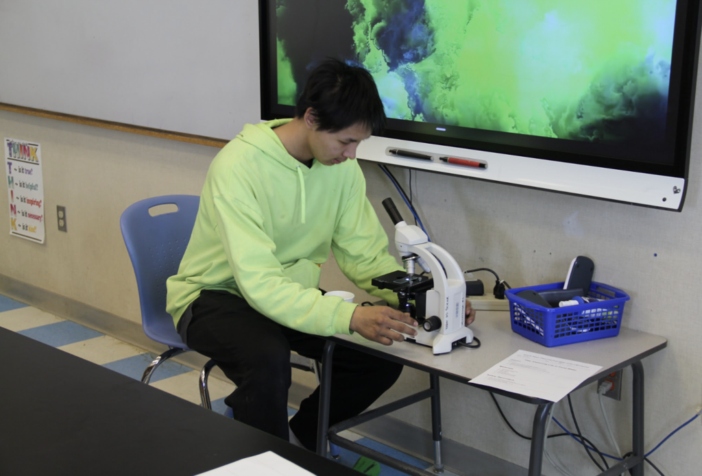 Galen Pushruk and Microscope Teller