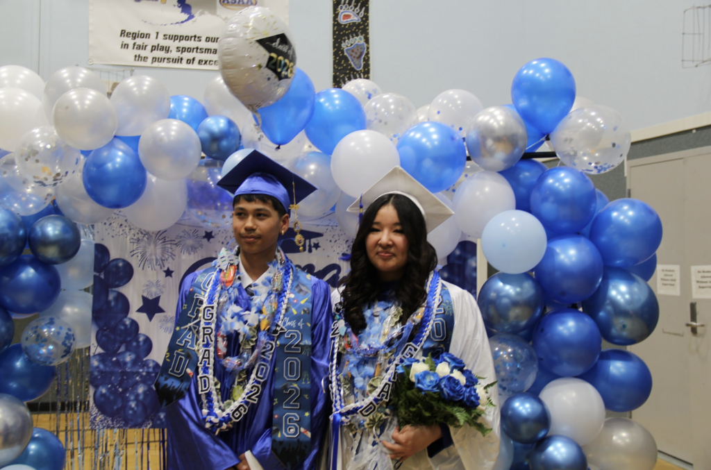 Ben and Taylor Pose after the graduation commencement 2026
