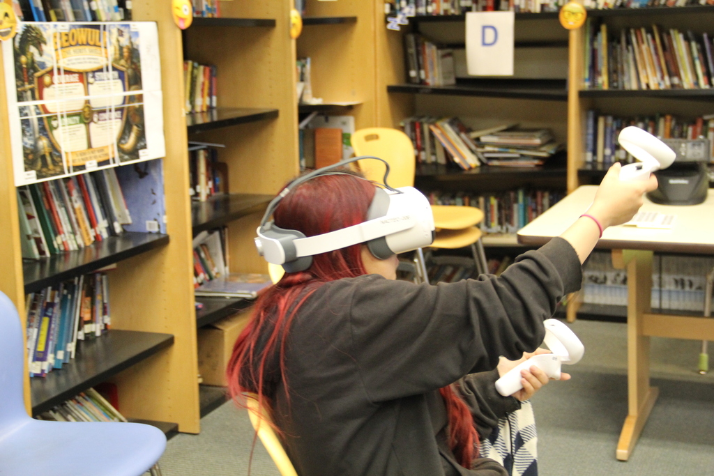 Freya fixing something with the VR Teller