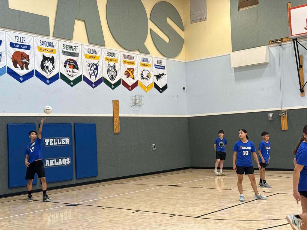 Galen serving ball in the air