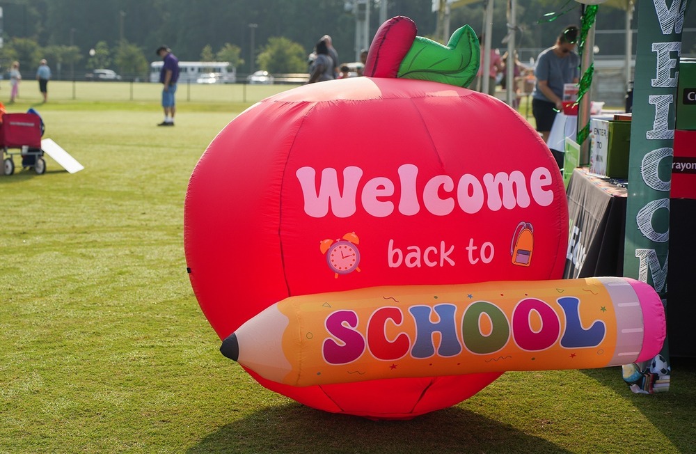 giant apple that says "welcome back to school