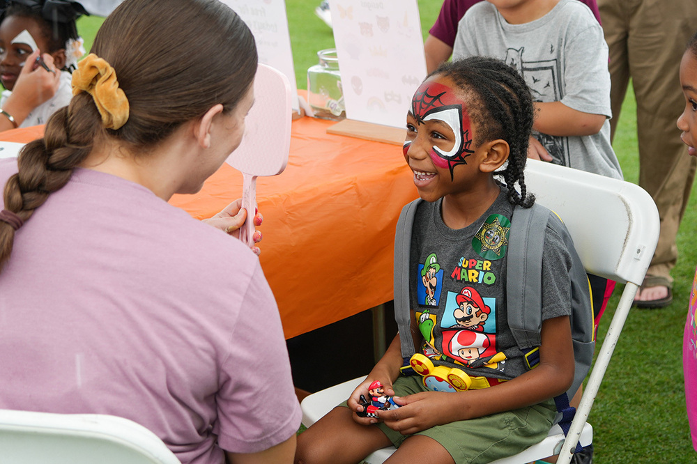photo from 2025 OneBerkeley Back to School Festival of child with face paint