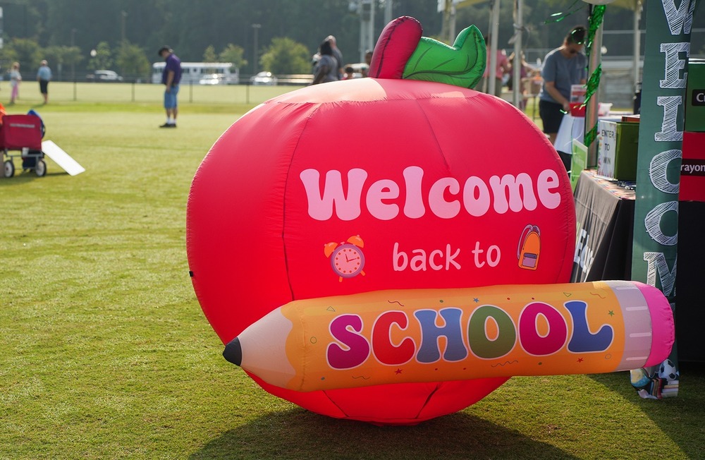 giant apple that says "welcome back to school