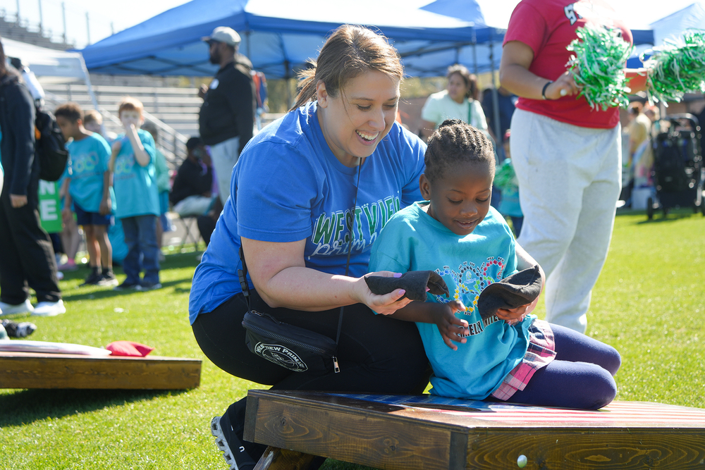 brooke melcher with student