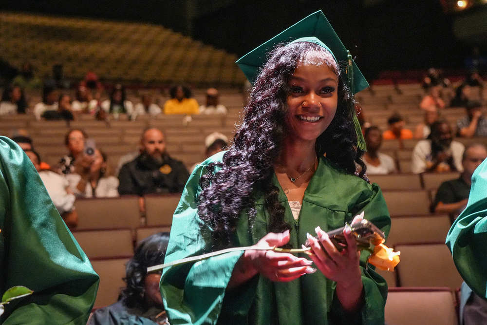 graduate with rose