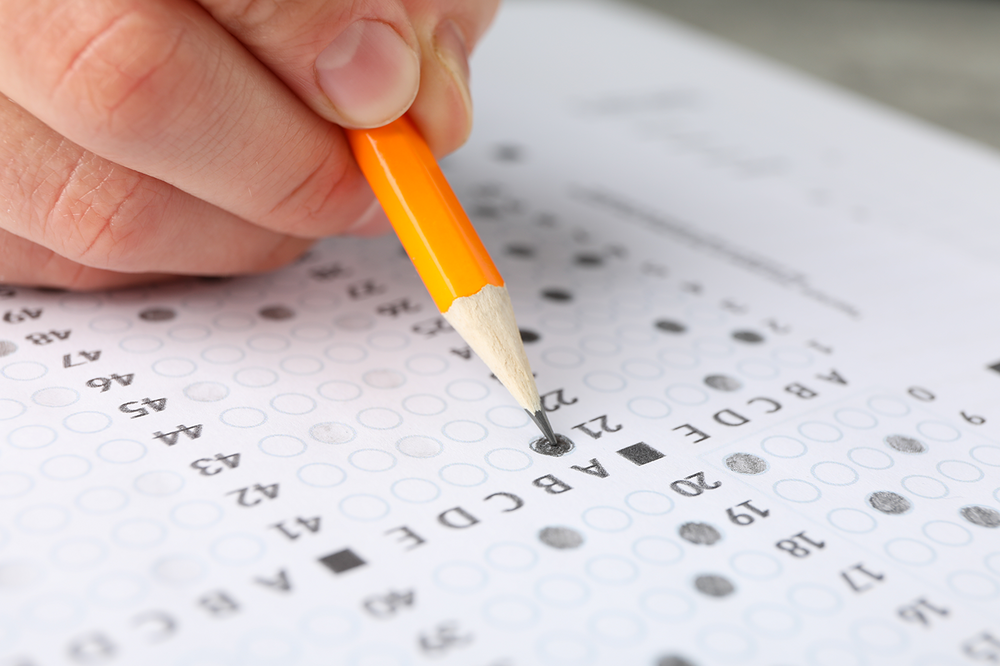 student filling out test