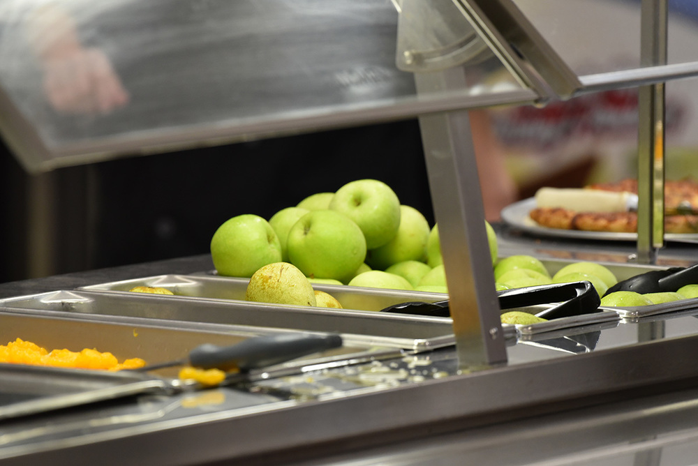 apples in school buffet line
