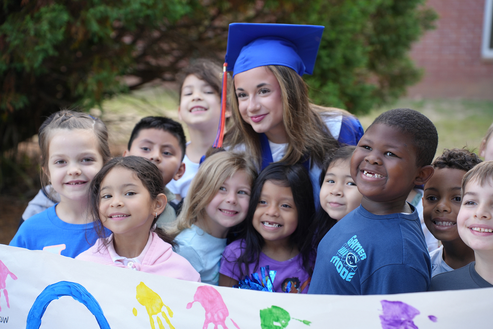 hhs graduate with elem students
