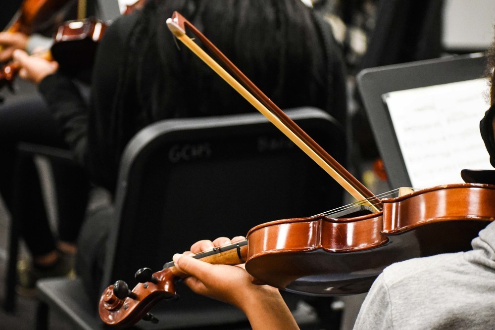 student playing violin