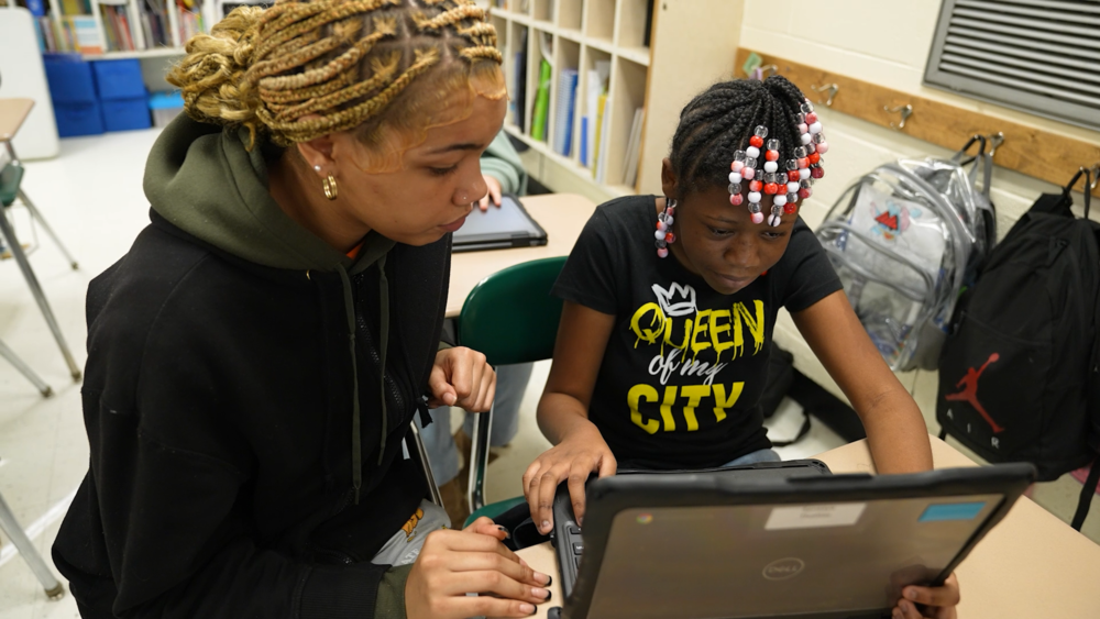 THS student teacher working with SSE student