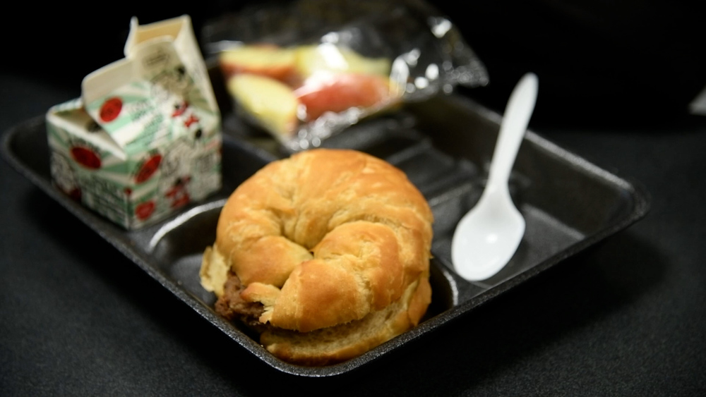 student breakfast on tray
